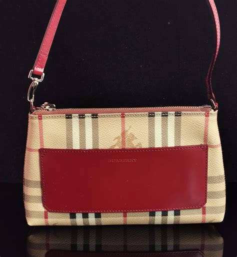 pochette burberry oro|burberry pouches for women.